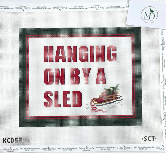 Hanging on by a Sled